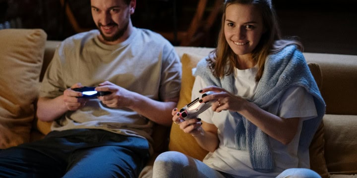 Man and woman playing video games